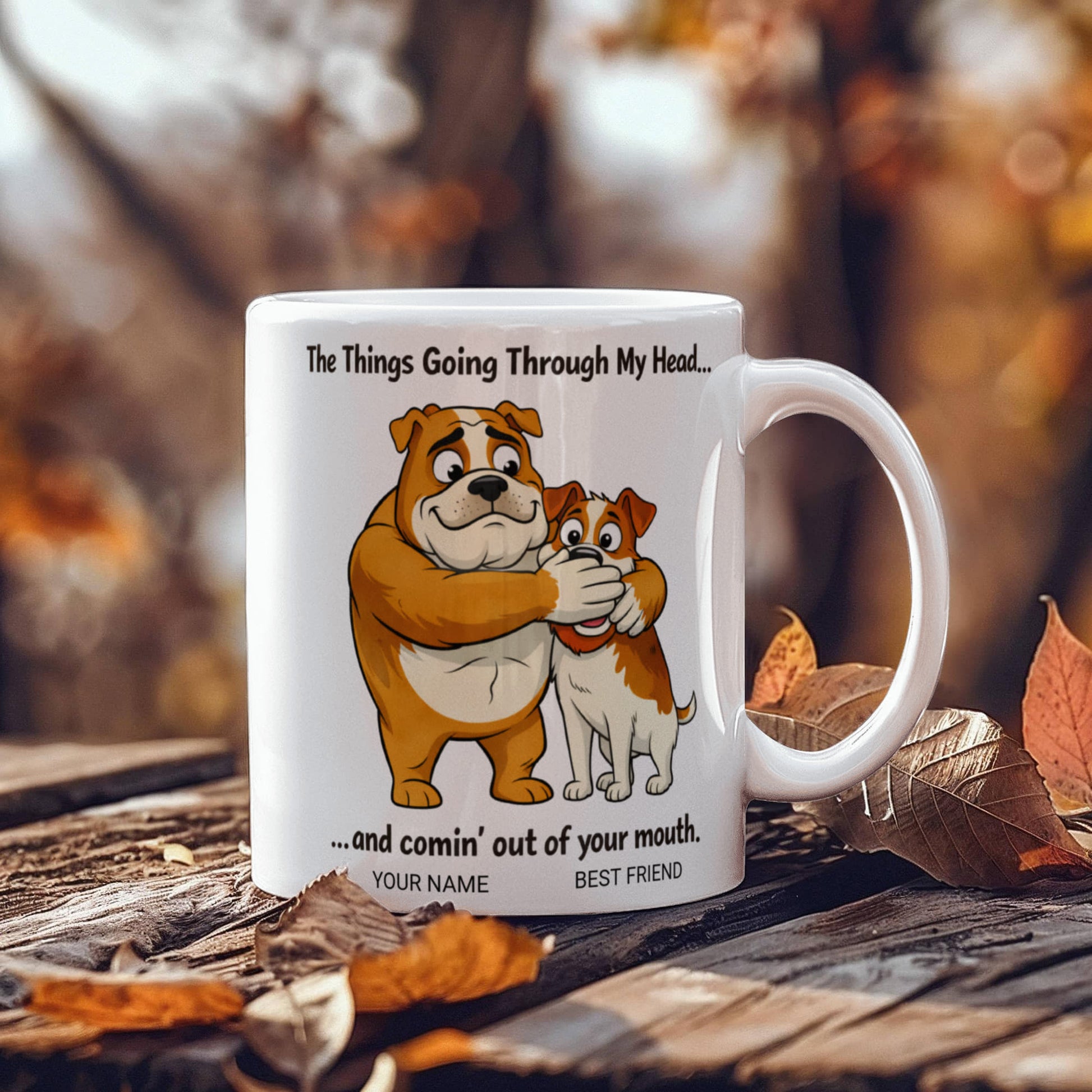 Mug with cartoon dogs and text on a wooden surface with autumn leaves