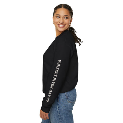 Woman wearing funny western sweatshirt with Whiskey River Hat  Co on Left sleeve